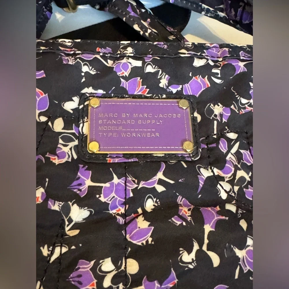 Marc by Marc Jacobs nylon laptop bag in a black and purple floral